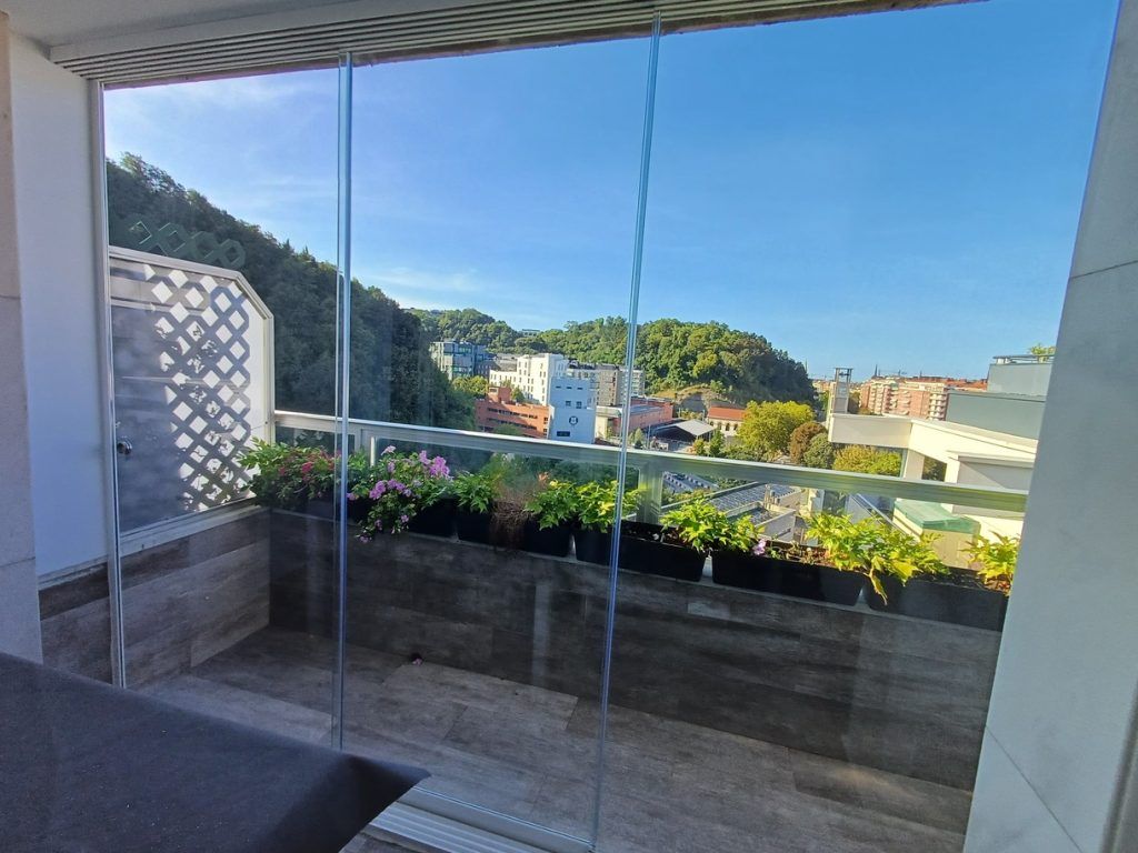 Iraola Cortinas de cristal en balcón